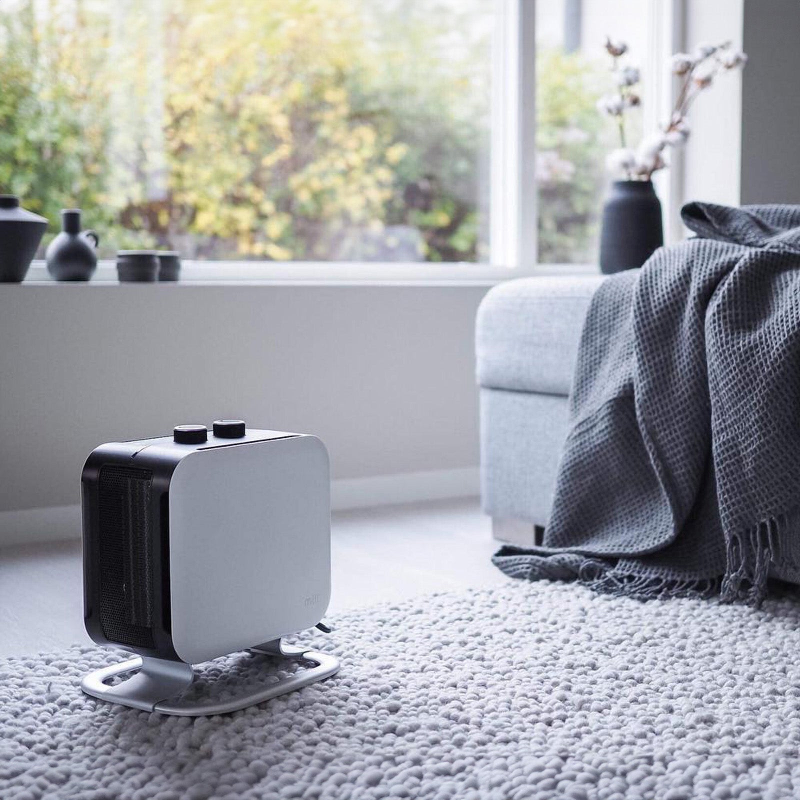 Mill 1800W White and Black Compact Fan Heater – powerful portable electric fan heater with fast heat output for small to medium rooms in Australia and New Zealand. Overheat protection, tip-over switch, compact design AU NZ.