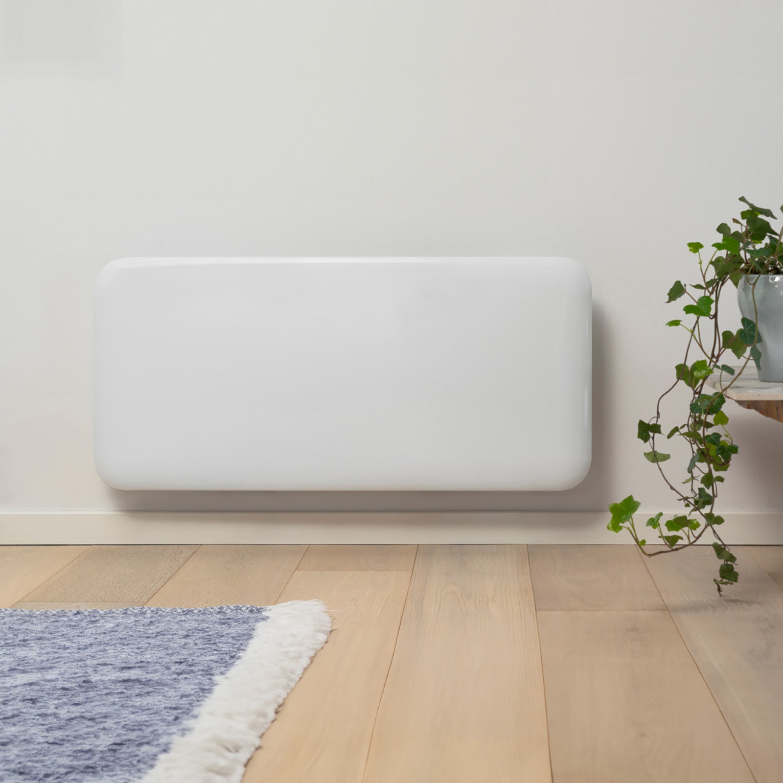 Mill 950W Invisible Panel Heater for Australian and New Zealand homes – elegant Scandinavian design electric panel heater with digital thermostat, IPX4 bathroom rating, overheat protection, and quiet operation. Wall mount electric heater AU NZ.
