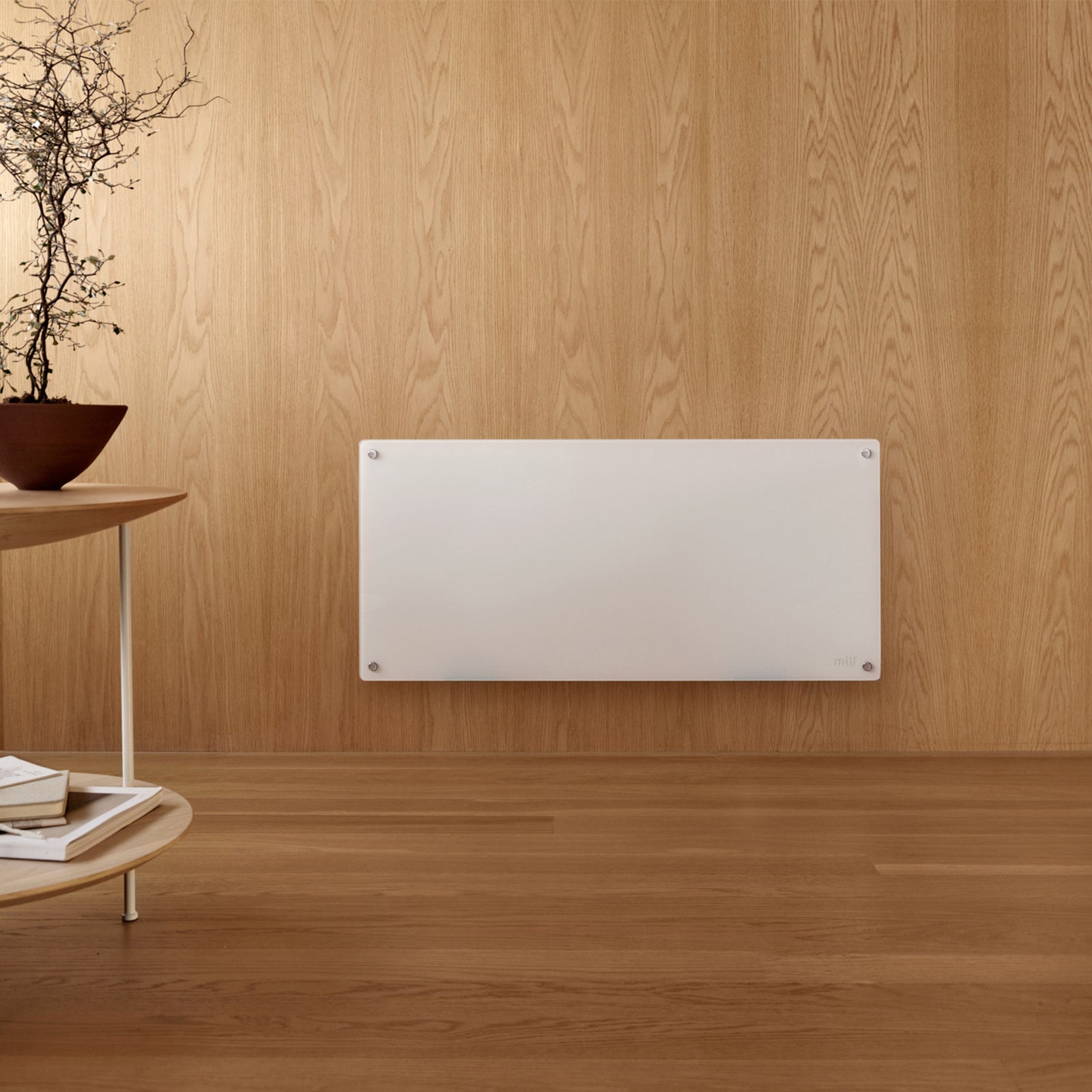 Mill 900W Smart Wi-Fi Glass Panel Heater – sleek glass front electric panel heater with app control for rooms up to 10m² in Australia and New Zealand. Wi-Fi smart heater, IPX4 bathroom approved, child lock AU NZ.